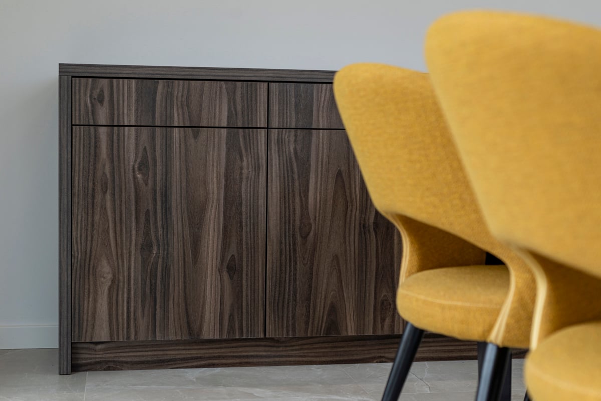 Walnut sideboard corner detail — mitred joinery