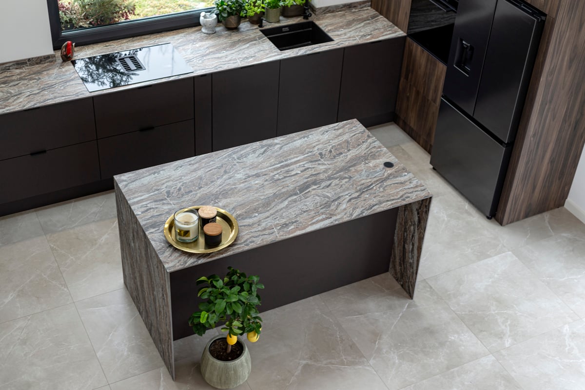 Kitchen elevated view showing island and full run