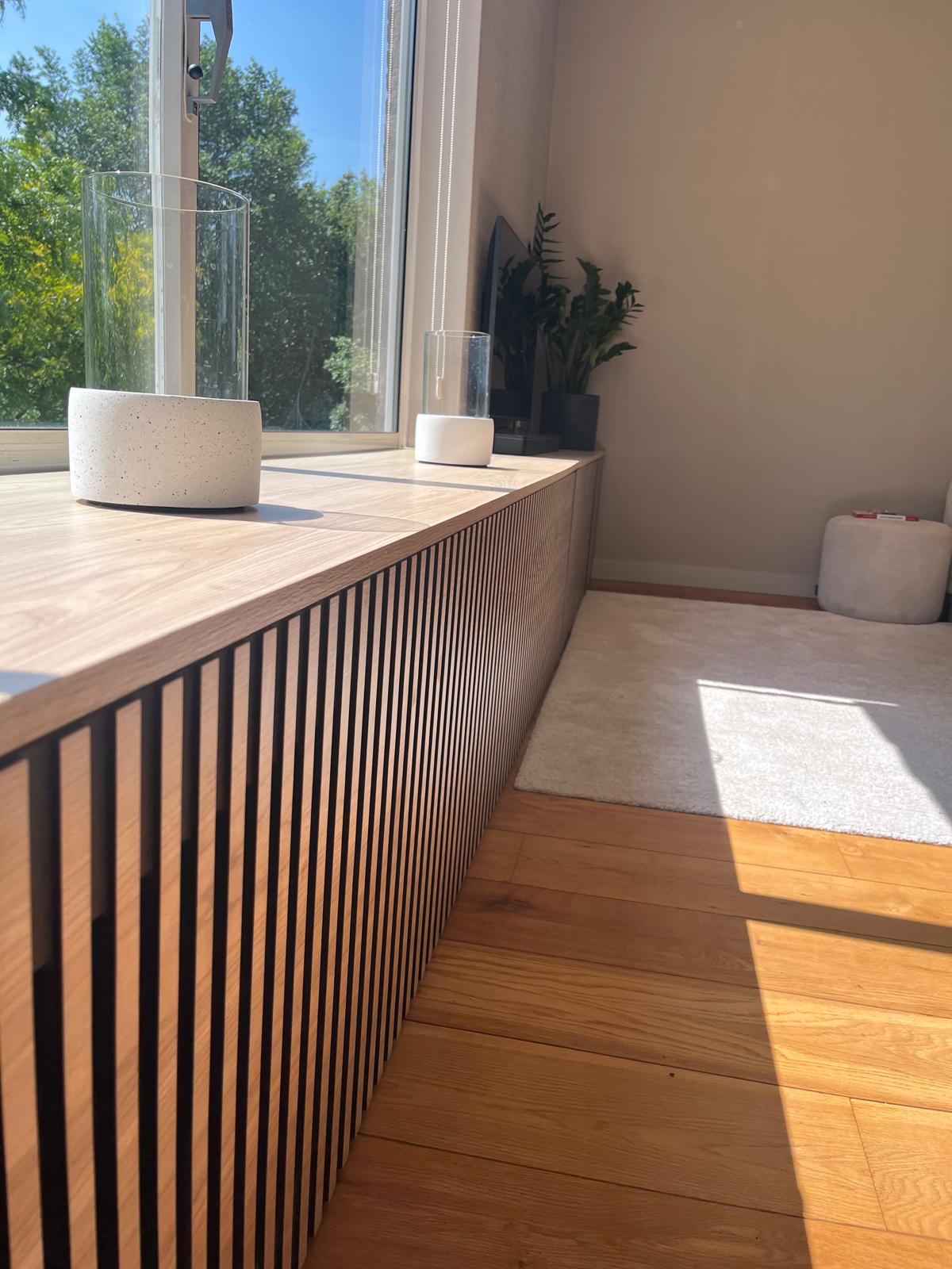 Slatted oak window bench with integrated radiator cover